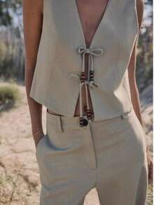 Conjunto de camiseta interior sin mangas con diseño de cuentas de cuello en V y pantalones casuales, estilo europeo y americano para mujer