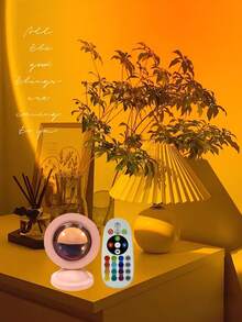 16 Colors RGB Sunset Projection Lamp | Remote Control Stage Projection Light, USB Powered | Smart Dimming & Color Adjustment | Romantic Sunset Desktop Lamp | LED Ambient Lighting For Party, Wedding, Photography And Home Decor | Perfect Gift