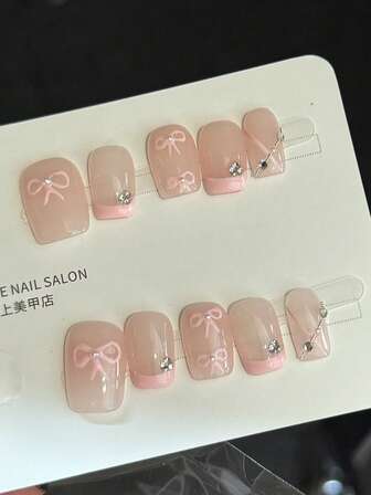 10pcs Pink Hand-Painted Bowknot Nail Art, Short Style, Sweet Girlish Ballet Style, Gentle French Wearable Nails. They Are Whitening, Tenderizing, And Feature A High-End Atmosphere. Purely Handcrafted, These Fake Nail Tips Are Reusable.