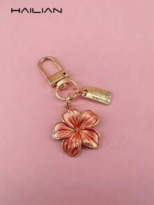 HAILIAN 1 pieza Llavero con forma de flor de cerezo de material de aleación, ligero y elegante con etiqueta rectangular, adecuado para colgar en bolsos, llaveros de coche, parejas, regalos de cumpleaños y festividades