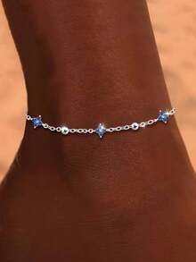 Tobillera de plata de ley 925 con trébol de cuatro hojas azul para mujer, con un diseño clásico adecuado para usar en vacaciones en la playa.