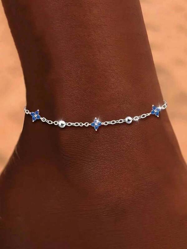 A Women's 925 Sterling Silver Blue Four-Leaf Clover Anklet, With A Classic Design Suitable For Wearing On Beach Holidays.