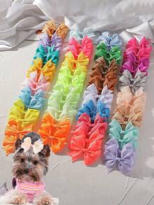 5/20/40个宠物马卡龙蝴蝶结发夹 - 可爱宠物的甜蜜必备单品。柔软有弹性的发夹设计，不会损伤毛发。多种马卡龙色可选。甜美的蝴蝶结造型，非常适合拍照和打卡。非常适合猫咪/小狗日常佩戴或派对造型。