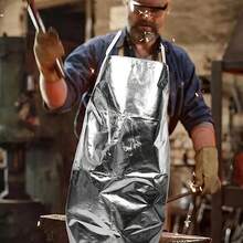 Este delantal de se.guridad aluminizado es fácil de limpiar y poner, resistente al calor, versátil, práctico y previene quemaduras. Es perfecto para cualquier cocina. El cinturón facilita su colocación y su talla es ideal para la mayoría de las personas. - Plateado - Ver 8