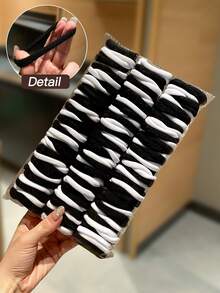 Conjunto de 100 elásticos de cabelo em cores sólidas, pretos e brancos, estilo casual versátil, acessórios de cabelo femininos para rabo de cavalo e tranças, adequados para uso diário, todas as estações, material escolar, acessórios femininos, acessórios para cabelo.