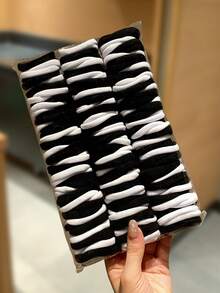 Conjunto de 100 elásticos de cabelo em cores sólidas, pretos e brancos, estilo casual versátil, acessórios de cabelo femininos para rabo de cavalo e tranças, adequados para uso diário, todas as estações, material escolar, acessórios femininos, acessórios para cabelo.