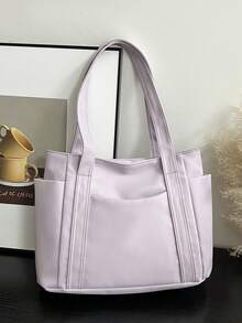 O geantă mov cu un design minimalist care interpretează temperamentul elegant. Material textil de calitate excelentă, delicat și moale la atingere, cu un corp drept și elegant. Stil clasic de purtare manuală, cu o curea de umăr lărgită și confortabilă, potrivită pentru purtare manuală pe un singur umăr. Buzunare multiple practice în față, clasificare ușoară.