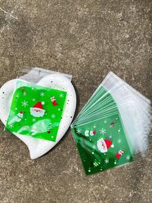 100 pièces Sacs d'emballage cadeaux verts OPP auto-scellants de 10 x 13 cm, avec motifs imprimés de Père Noël mignon et flocons de neige. Convient pour les faveurs et décorations de fête de Noël.