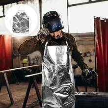 Este delantal de se.guridad aluminizado es fácil de limpiar y poner, resistente al calor, versátil, práctico y previene quemaduras. Es perfecto para cualquier cocina. El cinturón facilita su colocación y su talla es ideal para la mayoría de las personas. - Plateado - Ver 2