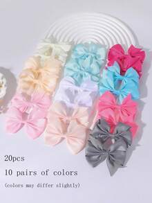 5/20/40个宠物马卡龙蝴蝶结发夹 - 可爱宠物的甜蜜必备单品。柔软有弹性的发夹设计，不会损伤毛发。多种马卡龙色可选。甜美的蝴蝶结造型，非常适合拍照和打卡。非常适合猫咪/小狗日常佩戴或派对造型。