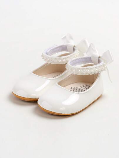Nuevos zapatos planos tipo Mary Jane para niñas, diseño con moño, suela de cuero sintético suave antideslizante, zapatos para caminar de bebé y niña pequeña, decoración con cinta de satén con perlas