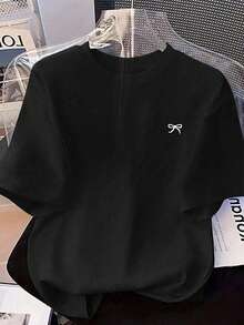 Camiseta oversize holgada de manga corta con estampado de lazos y hombros anchos. Las tallas son grandes. - Negro - Ver 1