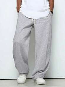 Men's Casual Sports Pants, With A Loose Straight Fit And A Drapey Feel, Suitable For Home And Outdoor Activities. They Can Be Used As A Couple's Gift. Made Of 100% Polyester Fiber, They Come With A Drawstring Waistband For Easy Adjustment And Are Available In Multiple Colors.