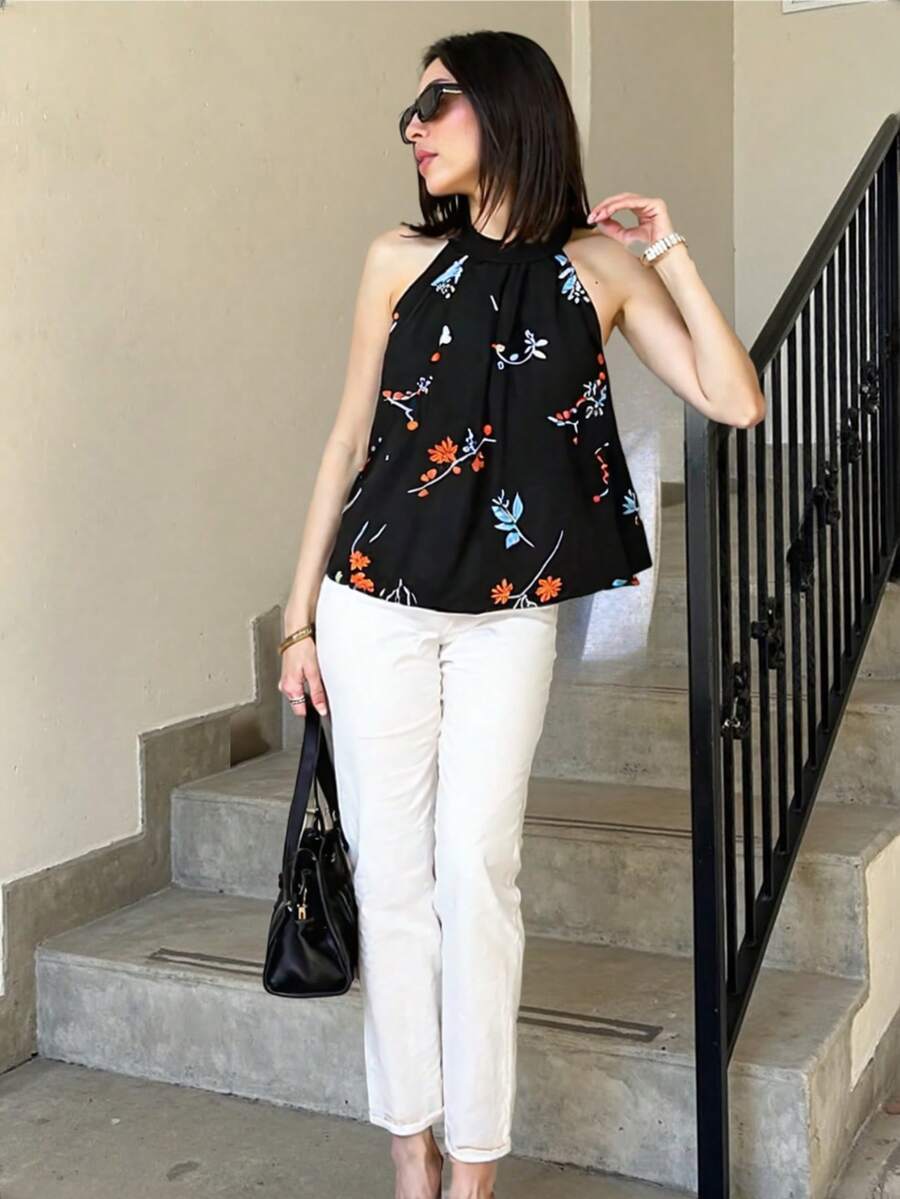 Blusa negra flores