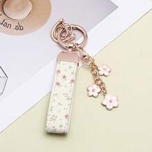 1 pieza Pulsera pintada de moda con elegante colgante, 1 pieza Llavero, Adecuado para colgar en la puerta del coche, bolso, llaves, Hecho de material de aleación, ¡Se ve genial en cualquier cosa, práctico y elegante!