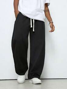 Men's Loose And Fashionable Sporty Long Pants, Featuring A Casual And Simple Solid Color Wide-Leg Design, With Drawstring At The Waist And Large Pockets, Suitable For Daily Strolls, Work, Travel, Etc