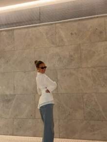 Camisa holgada asimétrica de manga larga con diseño de doble capa falso y camisa con cordón para mujer, para trabajo y casual elegante. Camisa blanca de manga larga con nudo y cuello clásico para mujer