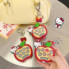 Sanrio Arcade Keychain - Apple Hello Kitty Edition. Officially Licensed Retro Accessory Blending Street Culture With Kawaii Charm.