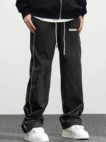 男士休闲运动长裤，宽松直筒版型，垂坠感十足。适合室内外活动，也可作为情侣礼物。面料为100%涤纶。配有抽绳腰带，方便调节，多种颜色可选。 - 黑色 - 查看 7