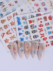 Calcomanías para decoración de uñas para fiestas, 24 hojas de pegatinas de arte de uñas festivas de Navidad, calcomanías de transferencia de agua para uñas de invierno con diseños de hombre de jengibre, Papá Noel, árbol, pingüino, ciervo, estrella y otros diseños lindos para decoración de manicura de Año Nuevo, suministros DIY de marca de agua