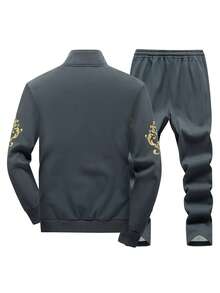 Men's Sportswear Set, Featuring A Long-Sleeved Full-Zip Sport Jacket With Embroidered Lettering And Coordinating Drawstring Athletic Pants, Designed For Both Outdoor Pursuits And Athletic Endeavors.