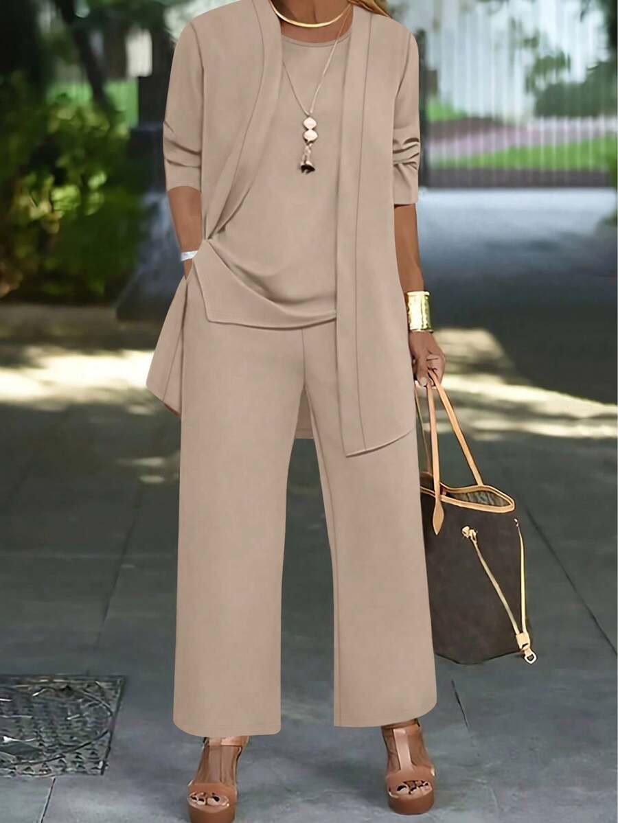 女士休闲纯色三件套:外套/开衫 + 圆领无袖上衣 + 松紧腰直筒裤,柔软弹力面料,宽松舒适,适合春/秋/冬穿着。 - 杏色 - 查看 1