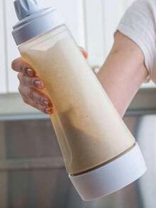1 Dụng cụ trộn bột bánh kếp dễ đổ kèm viên trộn - Thích hợp cho bánh nướng nhỏ, bánh nướng xốp và bánh kếp - Dụng cụ nhà bếp có vạch đo - Chai trộn bột cầm tay - Dụng cụ trộn bột - Bình chia kem - Nhiều màu - Xem 6