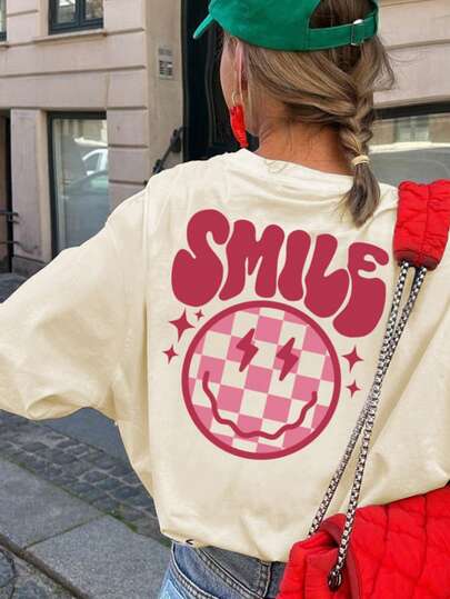 1 件女童休闲闪电笑脸图案印花圆领长袖 T 恤，秋季学生青年服装