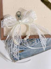 韩式优雅浅色丝带蝴蝶结，仿珍珠钥匙扣吊坠，甜美蕾丝包包配饰，汽车配饰，包包挂饰，学院风珍珠可爱哥特Y2K包包挂饰，汽车配饰，送给老师、朋友、姐妹的礼物创意