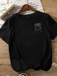 Camiseta de manga corta con cuello redondo para mujer, diseño gráfico de gato malhumorado con letras cirílicas, estilo casual de calle para verano. - Negro - Ver 3