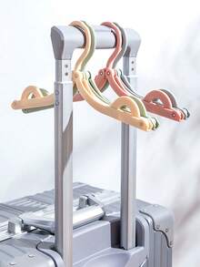 Umerașe de călătorie Macaron Color, multifuncționale, retractabile, portabile, pliabile, umerașe de călătorie pliabile, esențiale de călătorie, umerașe portabile pliabile pentru uscare a hainelor, umerașe pliabile ușoare pentru dormitoare, școli și turism, materiale plastice de uz casnic, accesorii de călătorie esențiale pentru nave de croazieră, suport de uscare pliabil pentru haine de bebeluși pentru casă și călătorii