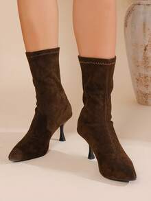 Botas cortas con tacón alto y puntera puntiaguda de estilo sexy, deportivo y de oficina para mujeres. Nuevas botas de calcetín elástico negro de tacón fino para otoño/invierno. Botas de media pantorrilla de moda casual y versátil para vestidos ajustados.