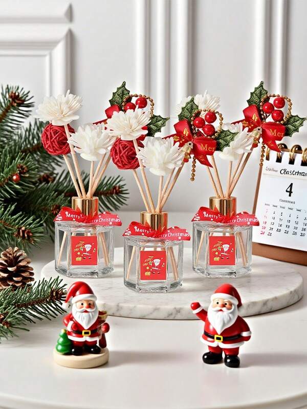 Conjunto de Aromaterapia com 6 peças, incluindo um difusor de aromaterapia e cinco varetas difusoras com elementos natalinos. Ideal para decoração de casa, mesas e ambientes, este conjunto é uma ótima opção de presente para amigos e familiares, lembrancinhas e decorações natalinas para o seu quarto.