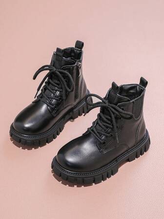 1 双时尚纯色侧拉链保暖内衬厚款儿童靴，适合冬季户外穿着