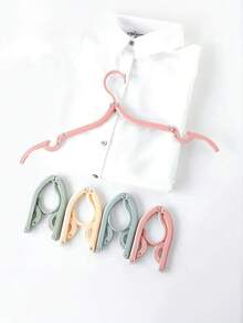 Umerașe de călătorie Macaron Color, multifuncționale, retractabile, portabile, pliabile, umerașe de călătorie pliabile, esențiale de călătorie, umerașe portabile pliabile pentru uscare a hainelor, umerașe pliabile ușoare pentru dormitoare, școli și turism, materiale plastice de uz casnic, accesorii de călătorie esențiale pentru nave de croazieră, suport de uscare pliabil pentru haine de bebeluși pentru casă și călătorii