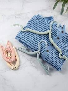 Umerașe de călătorie Macaron Color, multifuncționale, retractabile, portabile, pliabile, umerașe de călătorie pliabile, esențiale de călătorie, umerașe portabile pliabile pentru uscare a hainelor, umerașe pliabile ușoare pentru dormitoare, școli și turism, materiale plastice de uz casnic, accesorii de călătorie esențiale pentru nave de croazieră, suport de uscare pliabil pentru haine de bebeluși pentru casă și călătorii