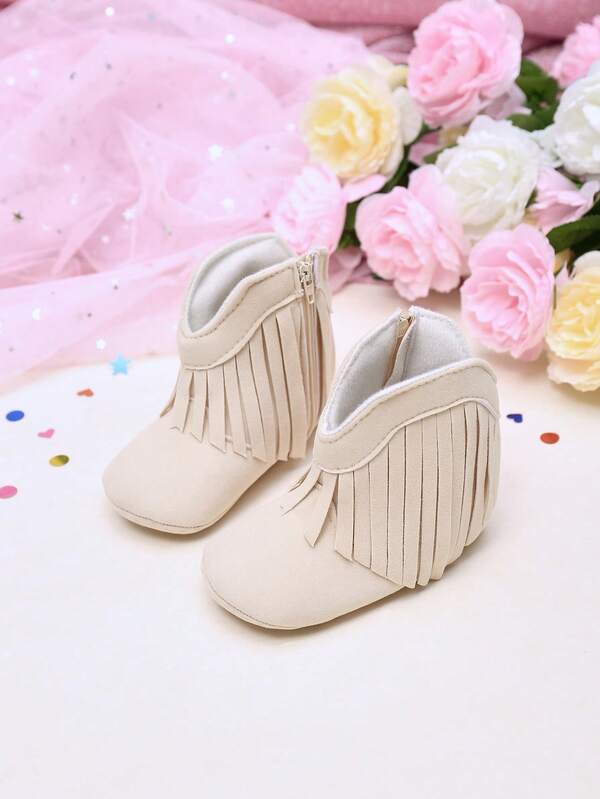Zapatos de bebé color albaricoque Yibubu, botas de flecos de moda para niñas, zapatos de vaquero occidental para primeros pasos e infantes, suela de goma antideslizante para recién nacidos