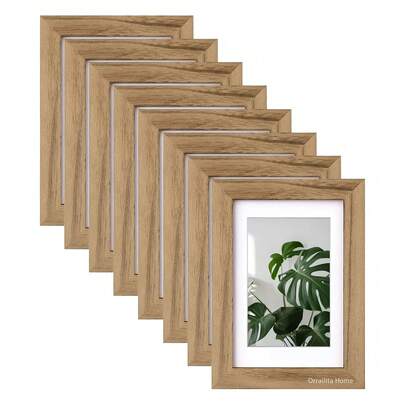 Un juego de 8 marcos de fotos decorativos (6 pulgadas 4 * 6), adecuados para exhibir en la pared y sobre la mesa, hechos de materiales duraderos como plexiglás y madera, se pueden exhibir vertical u horizontalmente, adecuados para fotos, carteles e impresiones artísticas