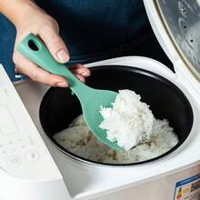 Self-Standing Silicone Rice Spoon, High-Temperature Resistant, Integrated Non-Stick Rice Spoon, Suitable For Use With Household Electric Rice Cookers To Hold The Self-Standing Rice Spoon.