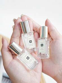 Jo Malone London [Mini] Pear & Freesia 9ml  / Top - Williams Pear & Heart - Freesia & Base - Patchouli / Orchards Steeped In Golden Sunshine, Warming The Russet Curves Of Luscious Pears. The Sensuous Freshness Of The Just-Ripe Fruit Wrapped In Elegant White Freesias, Enhanced With Rose And Rooted In Patchouli.