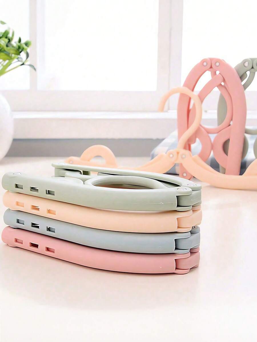 Umerașe de călătorie Macaron Color, multifuncționale, retractabile, portabile, pliabile, umerașe de călătorie pliabile, esențiale de călătorie, umerașe portabile pliabile pentru uscare a hainelor, umerașe pliabile ușoare pentru dormitoare, școli și turism, materiale plastice de uz casnic, accesorii de călătorie esențiale pentru nave de croazieră, suport de uscare pliabil pentru haine de bebeluși pentru casă și călătorii