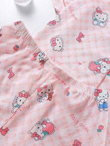 Sanrio Conjunto de 2 piezas de pijama para niñas y adolescentes con polo, cárdigan con bolsillos, estampado de Hello Kitty, flores y fresas, manga corta y pantalón corto, cómodo y casual