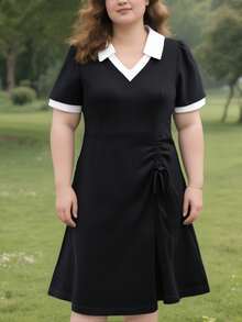 Vestido con cuello de solapa y cintura de estilo francés para una silueta estilizada. Elegante falda con tejido de primera calidad y textura sofisticada Vestidos cortos de mujer - Negro - Ver 1