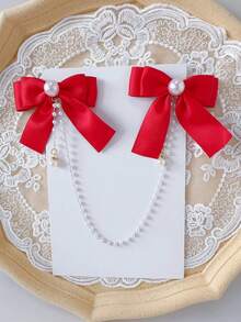 1 szt. dziewczęca, modna, śliczna spinka do włosów z kokardką i frędzlami. Nieznaczna różnica w kolorze może wynikać z partii materiału. Szczegóły na opakowaniu i w opisie produktu. Ilość perełek jest losowa. - Czerwony - Zobacz 5