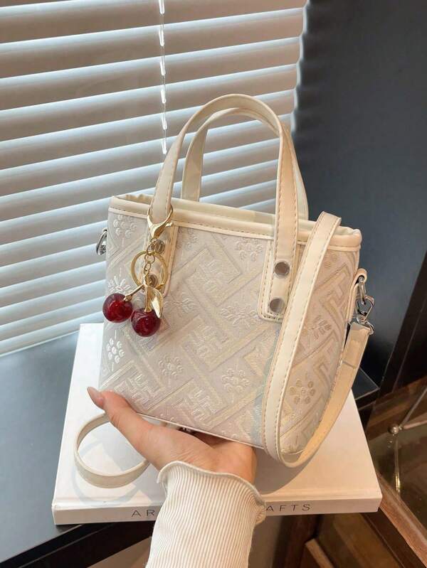 حقيبة يد مطرزة بطراز صيني جديد للنساء، حقيبة سعة كبيرة ذات طراز جديد لربيع وصيف 2025 ، حقيبة كتف متنوعة عالية الجودة مع علاقة بطابع عشوائي