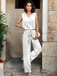 Jumpsuit Sin Mangas Escote En V Cintura Ajustable Con Cinturón Corte Recto Silueta Estilizada Diseño Minimalista Toque Sofisticado Ideal Para Mujer Moderna Casual Y Elegante - Blanco - Ver 2