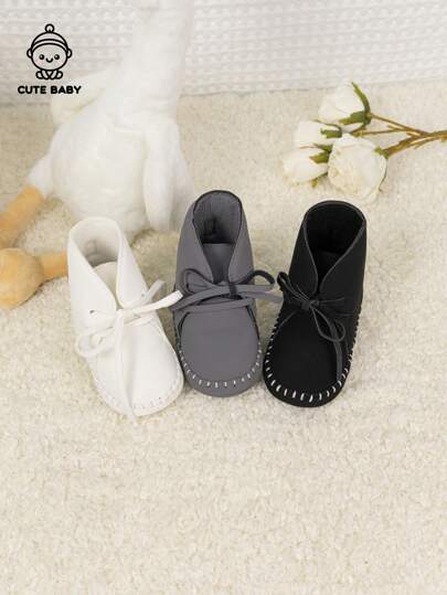 新生儿蝴蝶结系带踝靴，厚实保暖防滑鞋底，学步前鞋，秋冬款