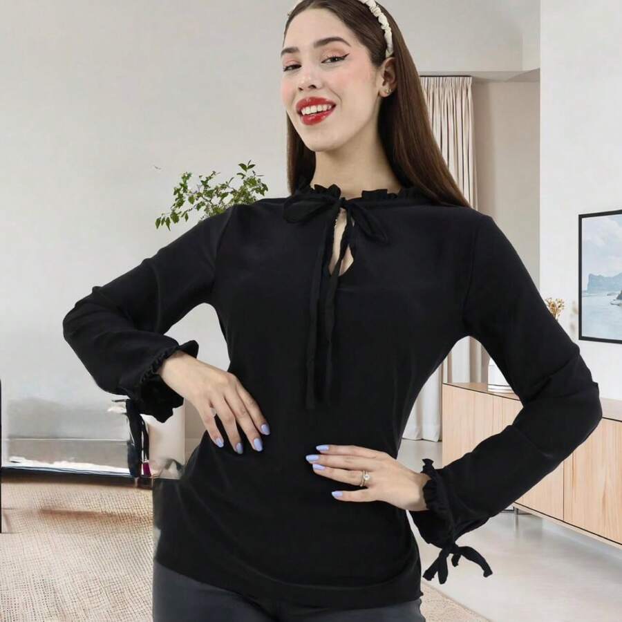 Blusa Elegante con Lazo y Detalles en Puños - Negro - Ver 1