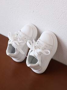 1 par de zapatillas casuales blancas de suela blanda para niños, cómodas para niños y niñas