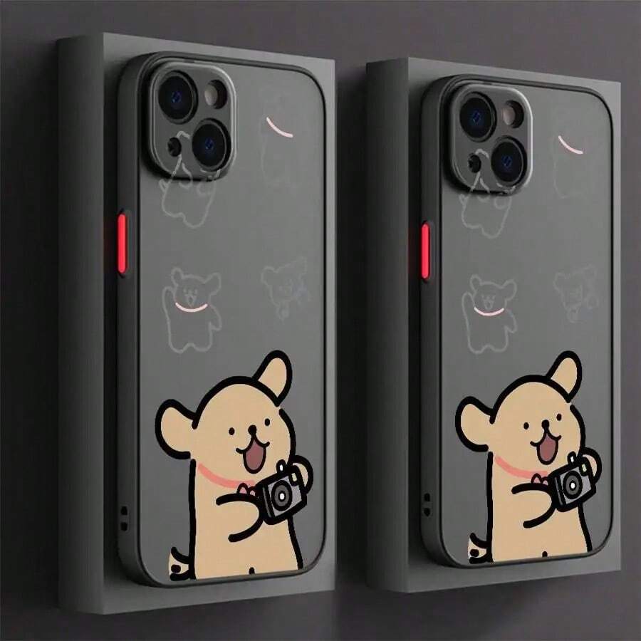 Una funda de teléfono mate con un diseño de caricatura de perro lindo, adecuada para 16, 15 Pro, 14 Plus, 13, 12, 11, 11 Pro, 12 Pro, 13 Pro, 14 Pro, 15 Pro y 16 Pro.Esta funda protectora de silicona de alta calidad ofrece - Colores mixtos - Ver 1